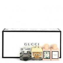 Gift Set -- Gucci Travel Set Includes Gucci Bloom Eau De Parfum, Gucci Bloom Acqua Di Fiori, Gucci Guilty, and Gucci Bamboo Eau De Parfum. All in 5 ml sizes.